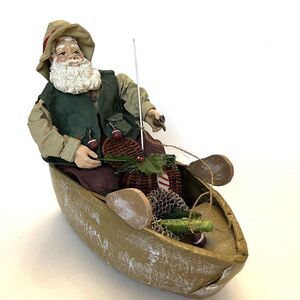 Clothtique Possible Dreams Fishing Santa In Wooden Boat Vacation Figurine